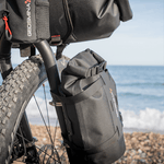 Geosmina Gen2 Cargo Bag & Cage bikepacking bag mounted to a front fork