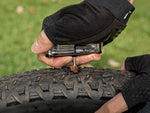 Topeak Tubi Repair Plug being used on a bike tyre