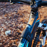 Blackburn Plugger Tubeless Repair Kit mounted to bike top tube with the strap