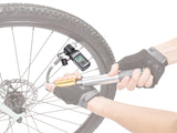 Topeak Shuttle Gauge Digital being used whilst tyre is being inflated with a hand pump