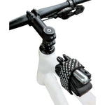 Lezyne Universal Strap being used to hold a CO2 cartridge, tyre levers and spare tube to top tube