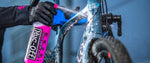 Muc-Off Nano Tech Bike Cleaner - 1L Bottle - being sprayed onto a bike