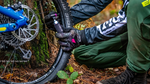 Muc-Off MTB CO2 Inflator Kit being used to inflate a MTB tyre